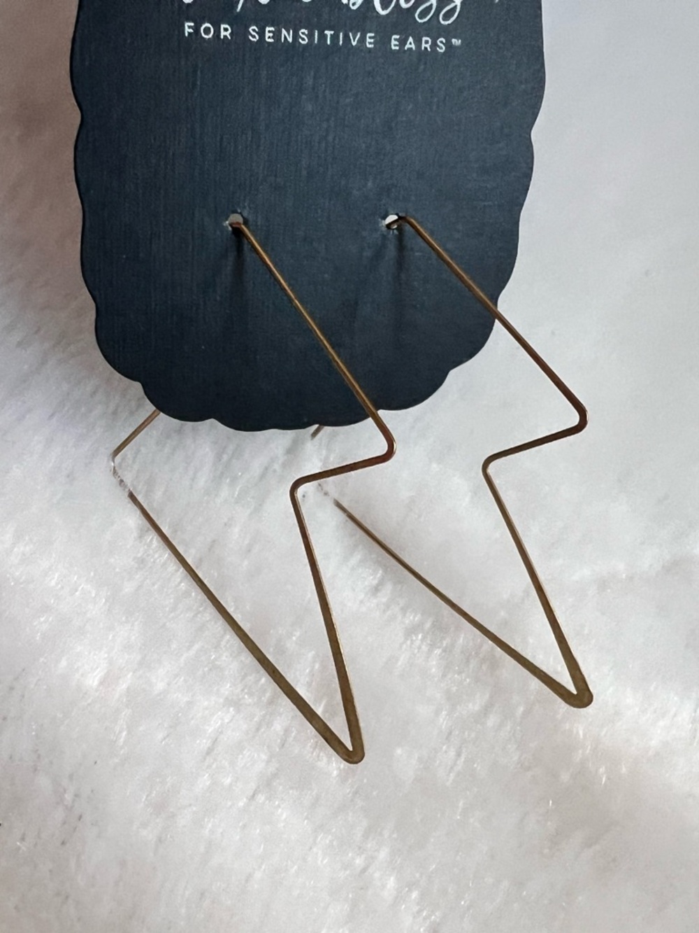 Gold tone lightning bolt earrings